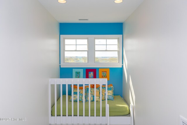 2216 S Shore Dr Unit A & B, Surf City, NC 28445 - bedroom with visible vents and recessed lighting