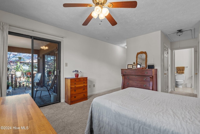 bedroom with carpet flooring, a textured ceiling, baseboards, access to outside, and attic access