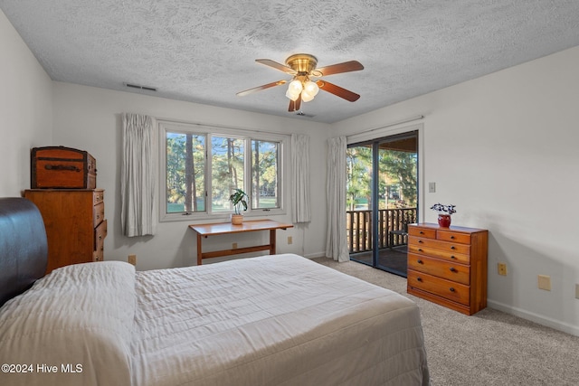 bedroom featuring a ceiling fan, access to outside, baseboards, light colored carpet, and visible vents