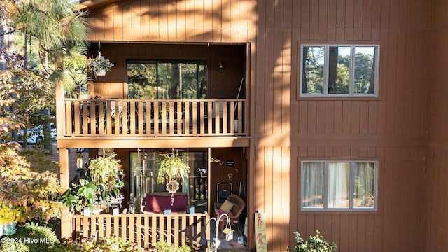 rear view of house with a balcony