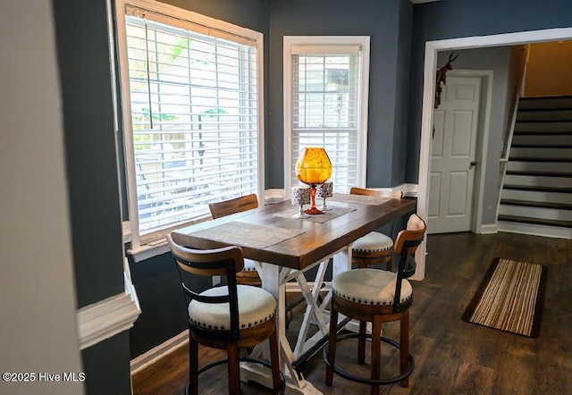 1714 Pine St, Elizabeth City, NC 27909 - dining room with baseboards, wood finished floors, and stairway