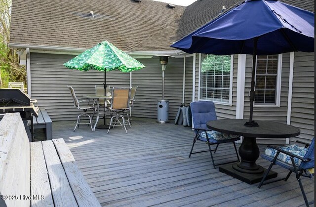 1714 Pine St, Elizabeth City, NC 27909 - wooden terrace with a grill and outdoor dining area