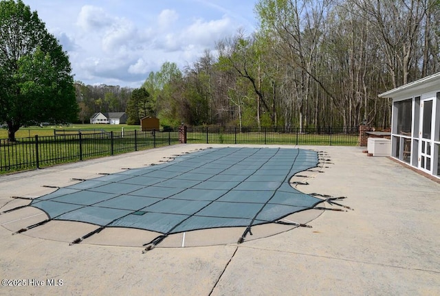 1714 Pine St, Elizabeth City, NC 27909 - view of swimming pool featuring fence, a sunroom, a patio, and a fenced in pool
