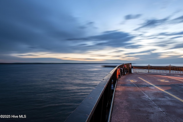view of dock with a water view