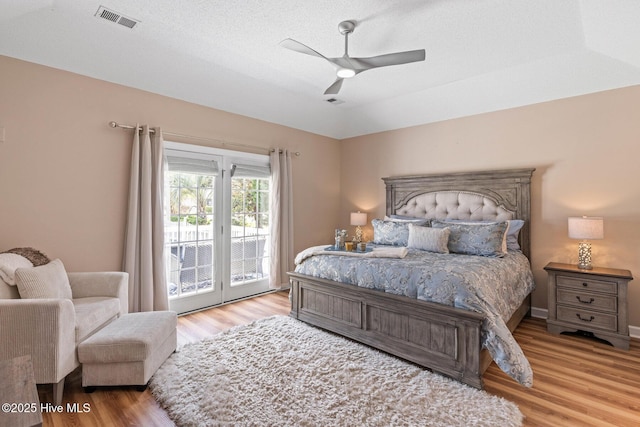 1096 Rutledge Ct NW, Calabash, NC 28467 - bedroom with access to outside, wood finished floors, and ceiling fan