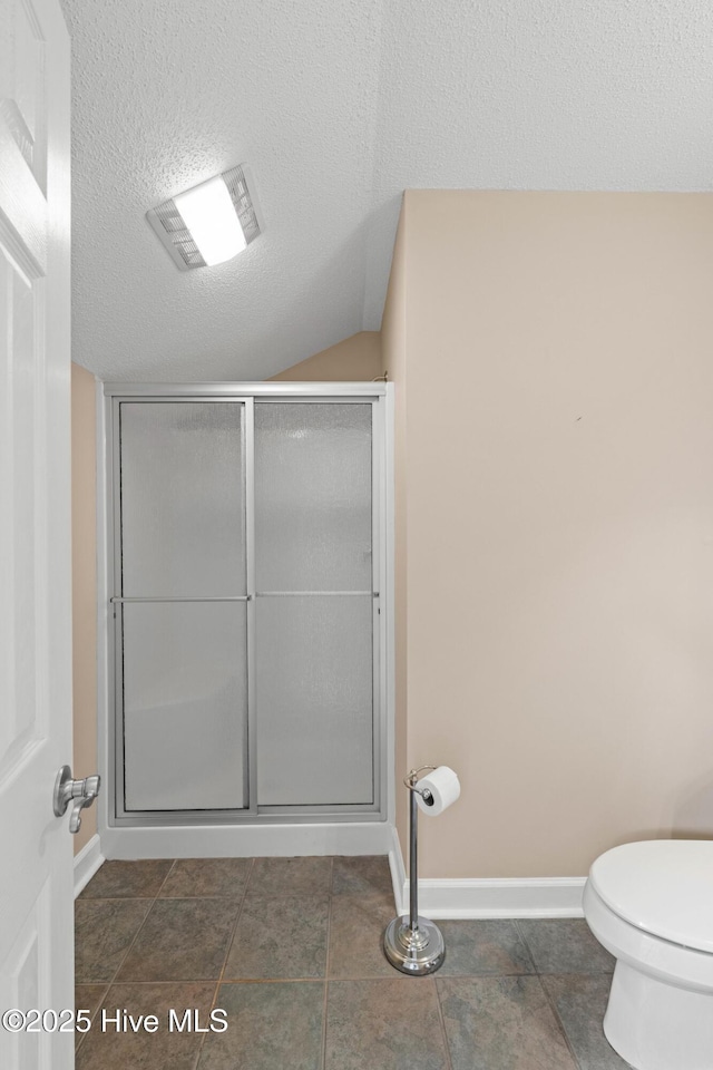 1096 Rutledge Ct NW, Calabash, NC 28467 - full bathroom with toilet, a textured ceiling, a shower stall, and baseboards