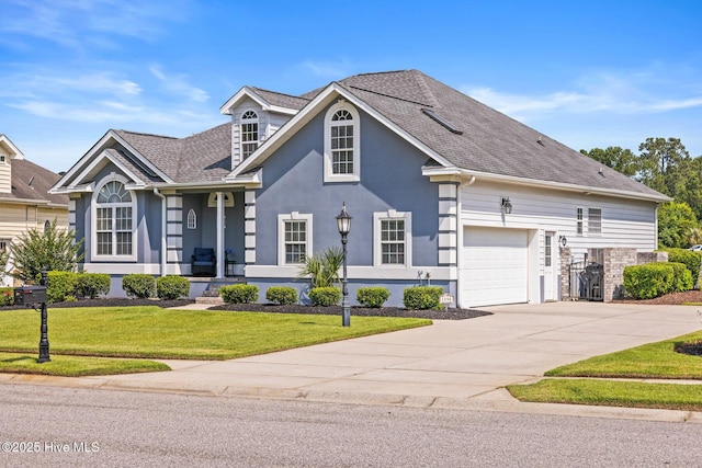 1096 Rutledge Ct NW, Calabash, NC 28467 - traditional home with stucco siding, a front yard, concrete driveway, a garage, and a shingled roof