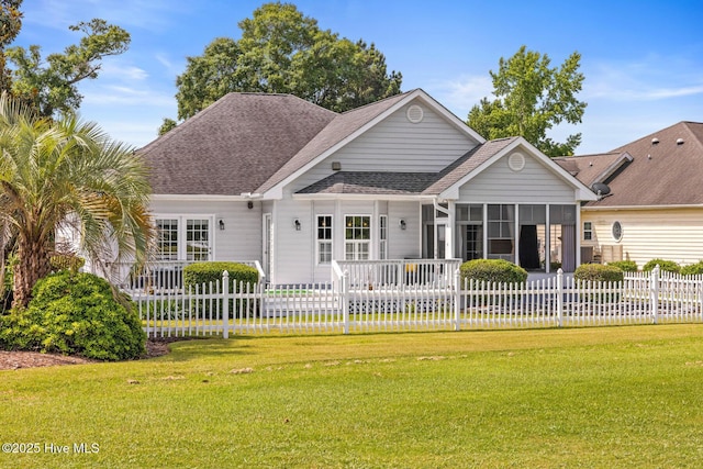 1096 Rutledge Ct NW, Calabash, NC 28467 - rear view of property featuring a sunroom and roof with shingles