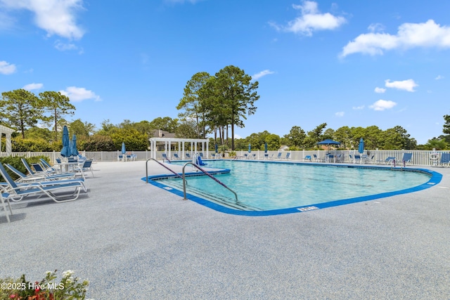 1096 Rutledge Ct NW, Calabash, NC 28467 - community pool featuring a patio area