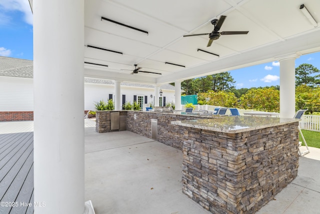 1096 Rutledge Ct NW, Calabash, NC 28467 - view of patio featuring a ceiling fan, exterior kitchen, and a deck