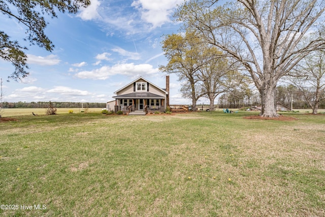 view of yard featuring a porch