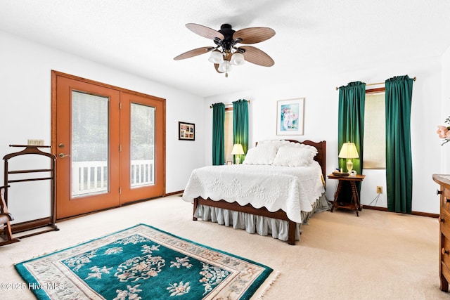 carpeted bedroom with french doors, ceiling fan, access to outside, and baseboards