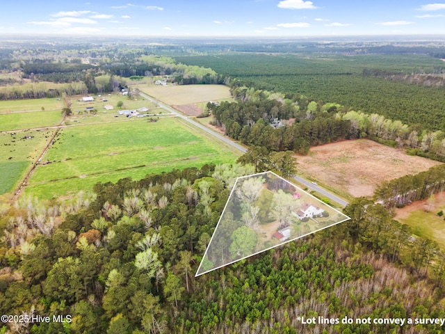 birds eye view of property featuring a rural view