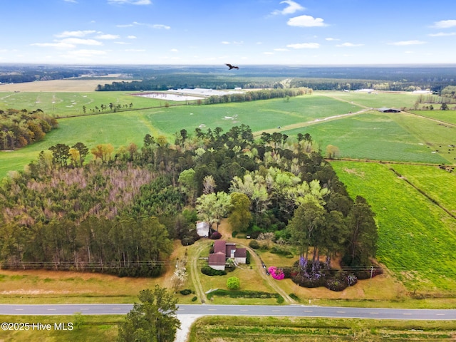 birds eye view of property with a rural view