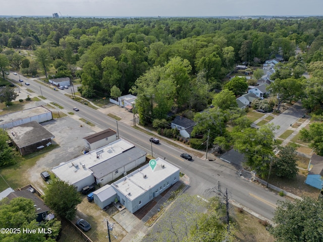 bird's eye view featuring a view of trees