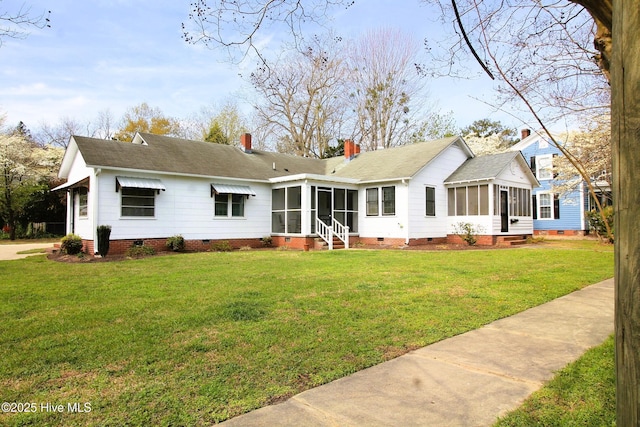 525 E 2nd St, Washington, NC 27889 - back of property with a sunroom, crawl space, a yard, a chimney, and roof with shingles