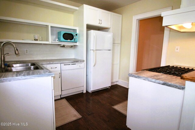 kitchen featuring a sink, white cabinetry, white appliances, extractor fan, and dark wood-style flooring