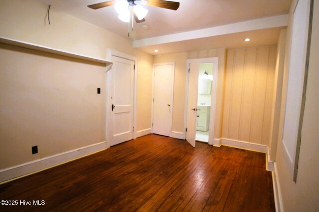 unfurnished bedroom featuring baseboards, recessed lighting, and wood-type flooring