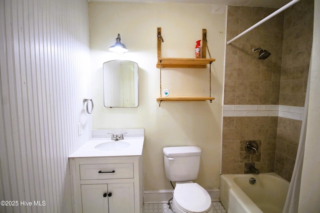 525 E 2nd St, Washington, NC 27889 - full bath with toilet, tile patterned floors, vanity, shower / washtub combination, and baseboards
