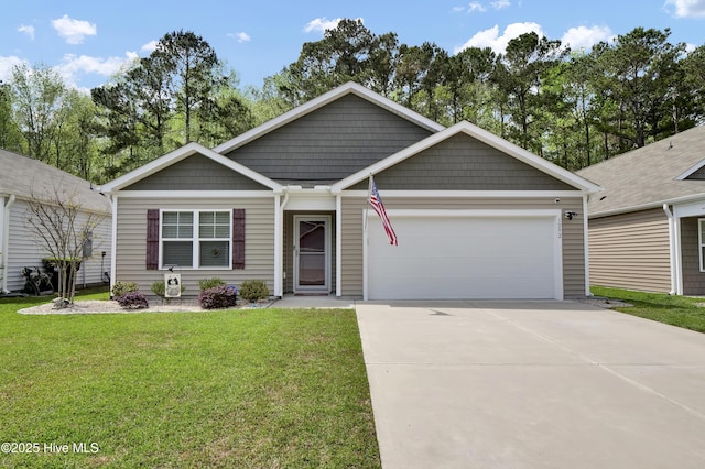 single story home featuring driveway, a front yard, and a garage