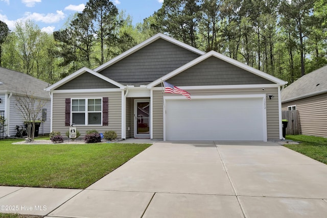 ranch-style house featuring an attached garage, concrete driveway, and a front yard