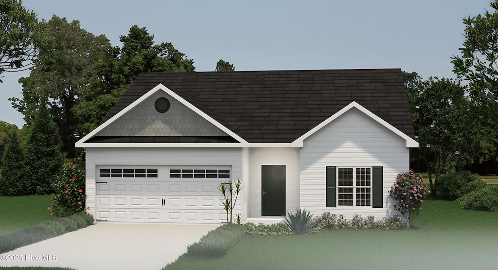 101 Talton Ests, Pikeville, NC 27863 - view of front of home with driveway, a garage, and a front lawn