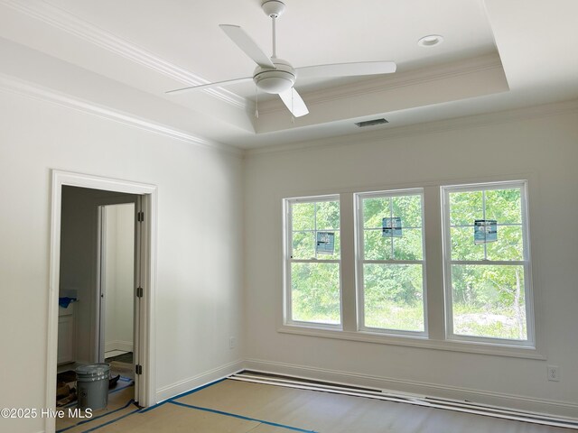 179 N Brightleaf Dr, Minnesott Beach, NC 28510 - spare room with a raised ceiling, healthy amount of natural light, crown molding, and ceiling fan