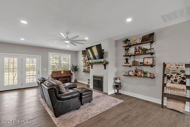 1560 White Oak River Rd, Maysville, NC 28555 - living room with a fireplace, a ceiling fan, baseboards, wood finished floors, and recessed lighting