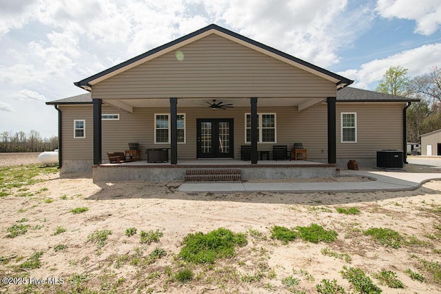 1560 White Oak River Rd, Maysville, NC 28555 - back of house with french doors, central AC, and ceiling fan
