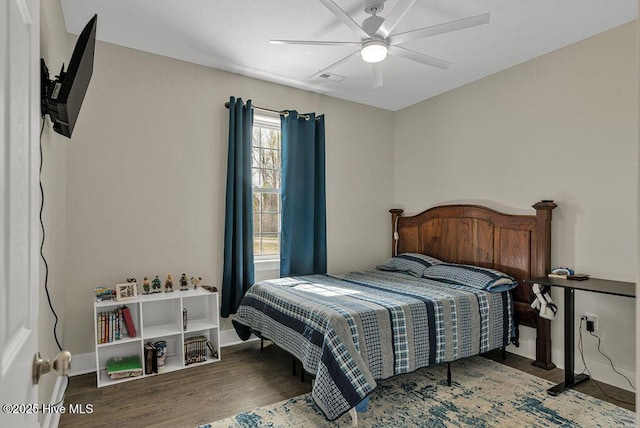 1560 White Oak River Rd, Maysville, NC 28555 - bedroom featuring wood finished floors, a ceiling fan, and baseboards