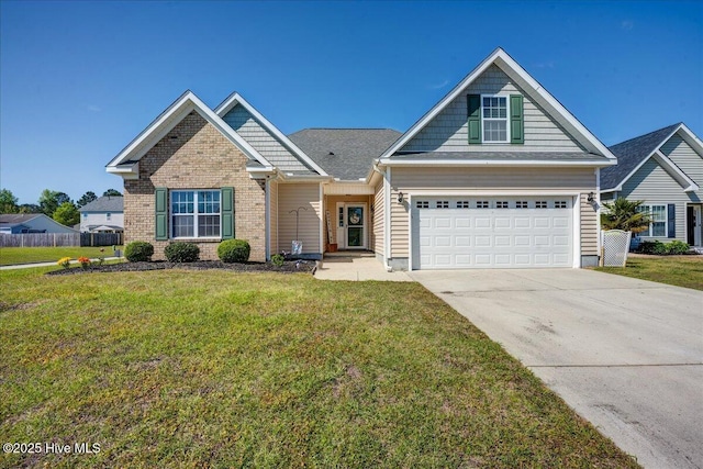 115 Kenmore Ct, New Bern, NC 28560 - view of front of home with a front lawn, concrete driveway, and fence
