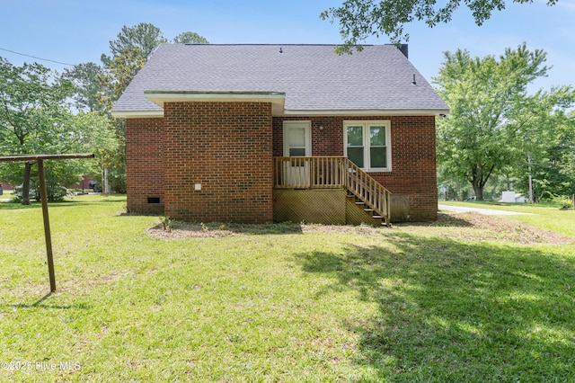 1507 Brookfield Rd, Rockingham, NC 28379 - back of house with a shingled roof, a yard, brick siding, and crawl space