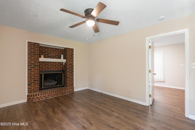 1507 Brookfield Rd, Rockingham, NC 28379 - unfurnished living room featuring a ceiling fan, wood finished floors, and a fireplace