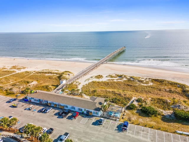 bird's eye view featuring a beach view and a water view