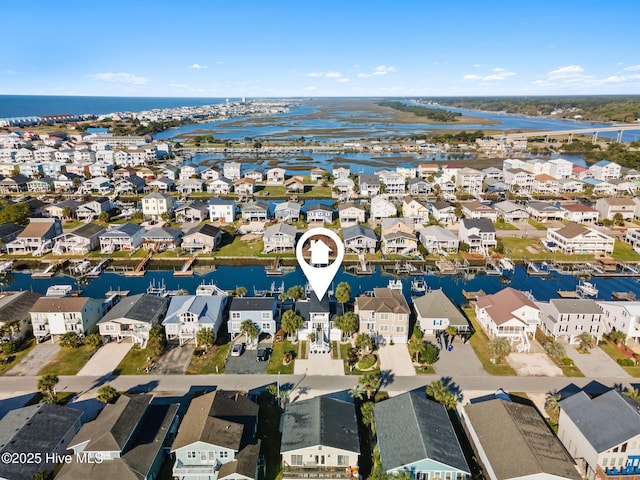 aerial view with a water view and a residential view