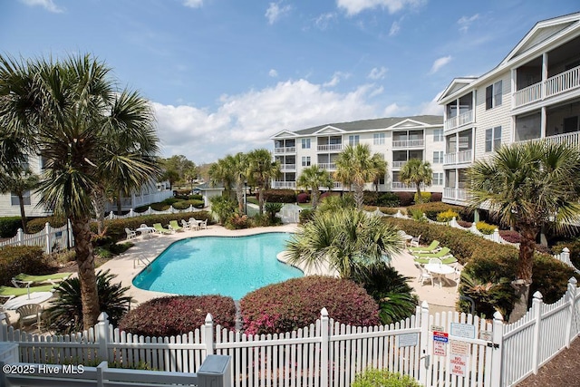 1135 Park Rd SW Unit 1203, Sunset Beach, NC 28468 - community pool with a patio area