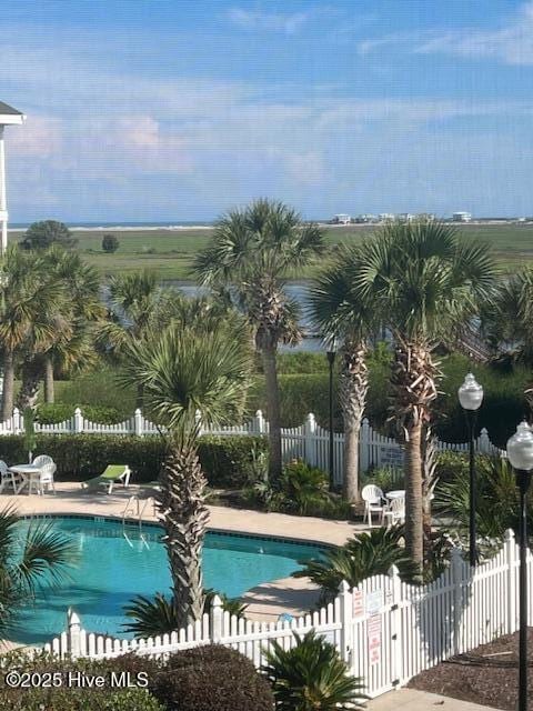 1135 Park Rd SW Unit 1203, Sunset Beach, NC 28468 - community pool with a patio