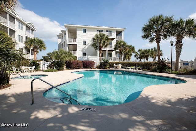 1135 Park Rd SW Unit 1203, Sunset Beach, NC 28468 - community pool featuring a patio area