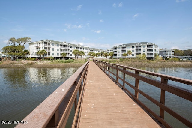1135 Park Rd SW Unit 1203, Sunset Beach, NC 28468 - dock with a water view and a residential view