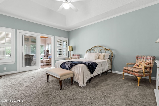 178 Edgewater Cir, Sunset Beach, NC 28468 - carpeted bedroom featuring a tray ceiling, crown molding, access to exterior, and baseboards