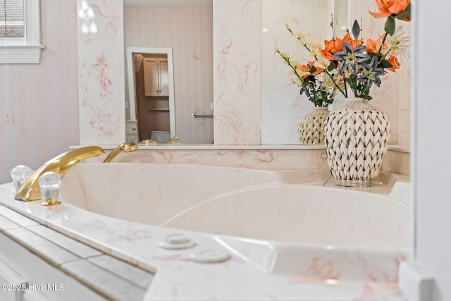 178 Edgewater Cir, Sunset Beach, NC 28468 - full bathroom with wallpapered walls and a garden tub
