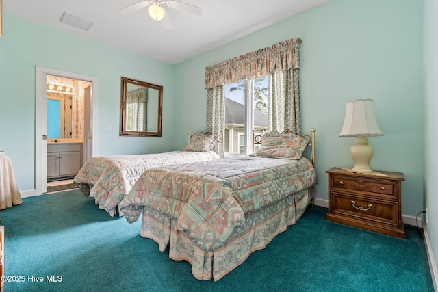 178 Edgewater Cir, Sunset Beach, NC 28468 - carpeted bedroom with visible vents, baseboards, connected bathroom, and a baseboard heating unit