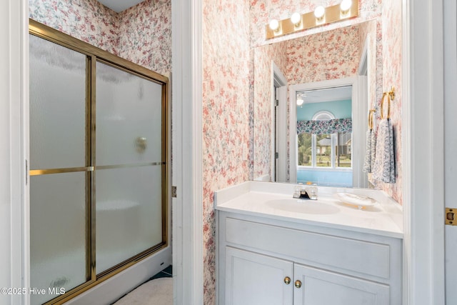 178 Edgewater Cir, Sunset Beach, NC 28468 - full bathroom featuring vanity, wallpapered walls, and a stall shower