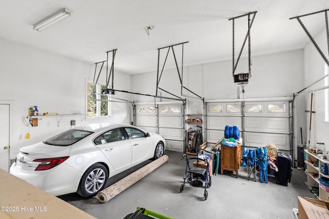 178 Edgewater Cir, Sunset Beach, NC 28468 - garage with a garage door opener