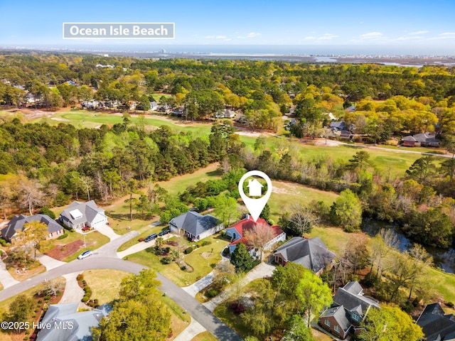 178 Edgewater Cir, Sunset Beach, NC 28468 - birds eye view of property with a wooded view and golf course view