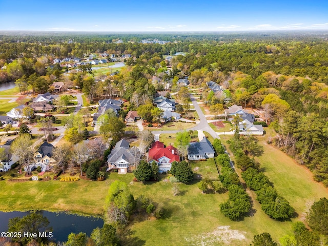 178 Edgewater Cir, Sunset Beach, NC 28468 - bird's eye view featuring a water view, a view of trees, and a residential view