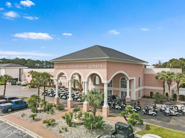 178 Edgewater Cir, Sunset Beach, NC 28468 - view of property featuring uncovered parking