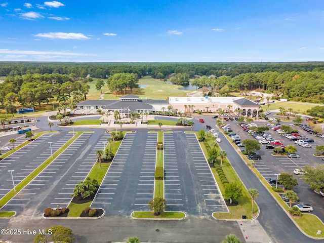 178 Edgewater Cir, Sunset Beach, NC 28468 - drone / aerial view featuring a wooded view