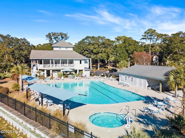 178 Edgewater Cir, Sunset Beach, NC 28468 - pool featuring a patio area, fence, and a hot tub
