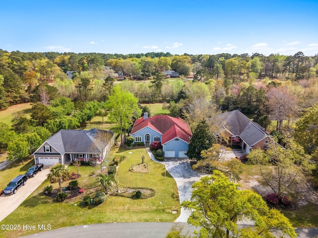 178 Edgewater Cir, Sunset Beach, NC 28468 - bird's eye view with a forest view